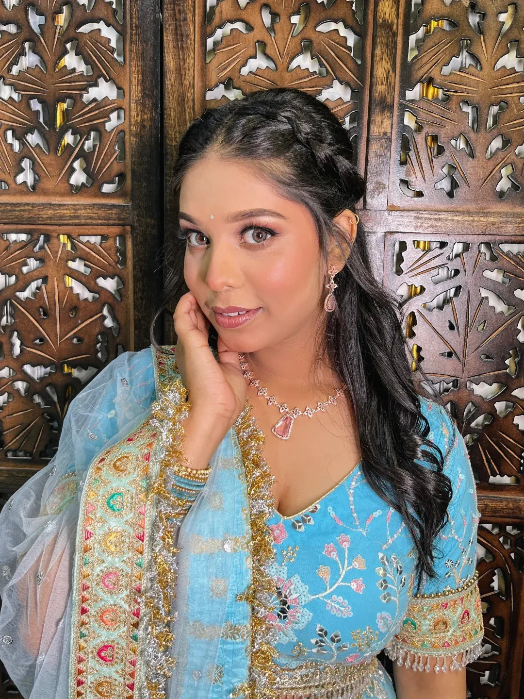 Engagement makeup – blue lehenga with braided hair